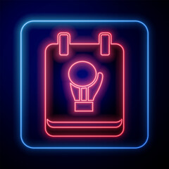 Wall Mural - Glowing neon Boxing glove icon isolated on black background. Vector