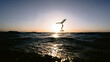 © Travel 'n' Lifestyle - Wingsurfer having evening foil session in Red Sea, Egypt.