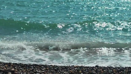 Wall Mural - Seashore with waves in summer.