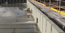 A Wheelbarrow On A Rooftop Of A Building Under Construction