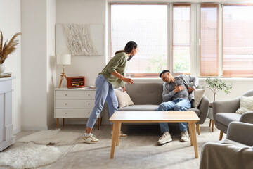 Poster - Young woman and her husband having heart attack at home