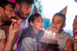 © ivanko80 - Group of friends celebrating birthday