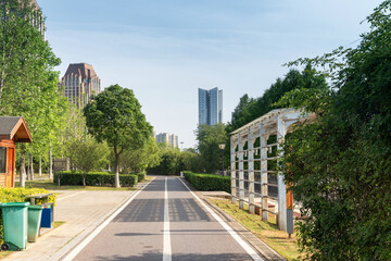 Wall Mural - Empty urban road and buildings in the city