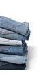 © New Africa - Stack of different folded jeans isolated on white