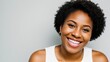 © Vitalii - Portrait black skin model woman with white teeth smile, healthy hair and beauty skin on grey background. Generative AI