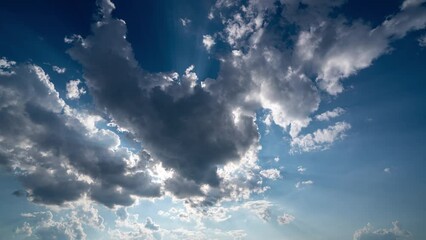 Wall Mural - blue sky white clouds. puffy fluffy white clouds. cumulus cloud cloudscape timelapse. summer blue sk