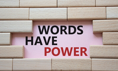 Words have power symbol. Wooden blocks with words Words have power. Beautiful pink background. Business and Words have power concept. Copy space.