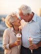 © Kalim - Ai generated photo of mature senior couple with ice cream