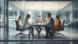 © annebel146 - Diverse millennial business team talking in meeting room, negotiating on project at table at glass wall panoramic window, discussing deal in open space, modern office interior. blurred background