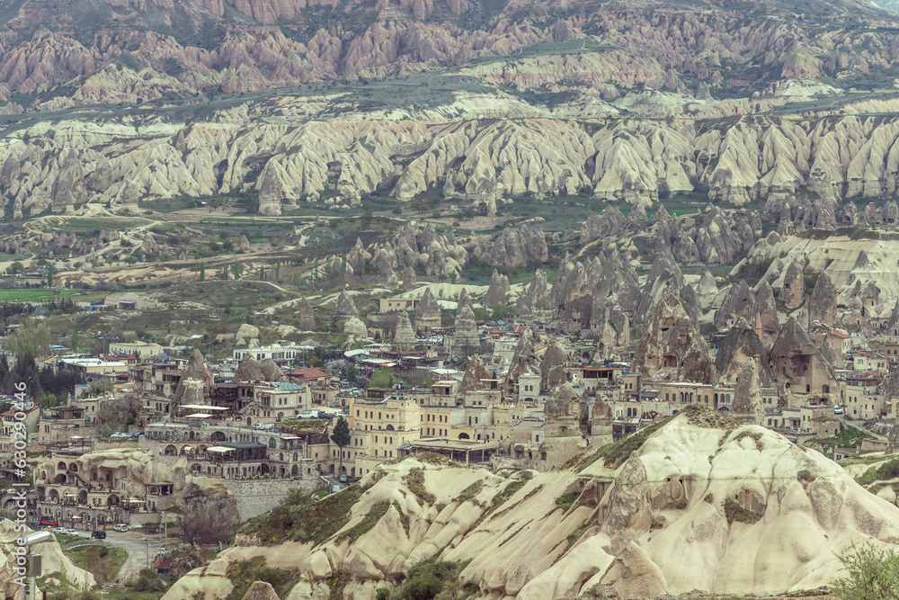 View of Goreme, an ancient old town in the Goreme Valley with fairy ...