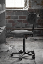 Old Office Chair In An Abandoned Cellar