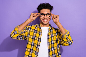 Canvas Print - Photo of attractive good mood guy wear plaid yellow shirt arms spectacles isolated violet color background