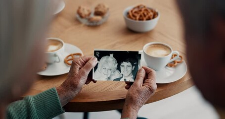 Wall Mural - People, hands and photograph with memory at home for nostalgia, history and to remember. Closeup of senior friends at tea table with pictures of old album, marriage and photography in retirement