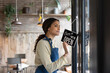 © ReeldealHD images - Hispanic store owner opening for business