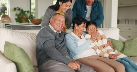 Sticker - Grandparents, relax and happy family together in lounge for bonding in living room, home or watching a tv show or movie on the weekend. Kid, parents and senior couple hug on sofa for quality time