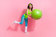 © deagreez - Photo of sporty trainer lady enjoy practice sport with pilates yoga fitball isolated on pastel color background