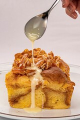 Sticker - Bread Pudding Dessert with Caramel Pieces on Top and Condensed Milk