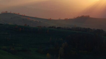 Canvas Print - Golden sunset shining over the big mountains and forests