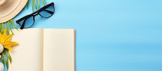 Poster - A writing book with summer beach accessories on a background, space for writing. Flat layout with room for text.