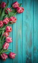 Bunch Of Pink, Yellow And White Tulips On A Blue Grunge Wooden Background.