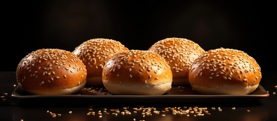 Canvas Print - Fresh burger buns made from scratch, topped with sesame seeds. Empty area for adding your own creative touch.