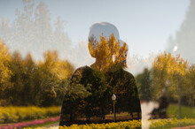 Double Exposure Of Young Woman In Sweater And Yellow Trees Outdoor