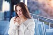 © BillionPhotos.com - Beautiful happy young beautiful woman relaxing with cup of tea