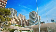 Beautiful New Modern Residential Area In Monaco. Skyscrapers Buildings With Beach Views, Tall Glass Window Luxury Houses In Monaco, French Riviera.