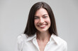 © Giulio_Fornasar - Smiling woman in formal white shirt