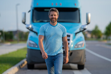 Men driver near lorry truck. Man owner truck driver near truck. Handsome middle aged man trucker trucking owner. Transportation industry vehicles. Handsome man driver front of truck.