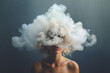 A young woman with her head in a misty cloud. The concept of depression, addiction, loneliness and mental health. 