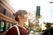 © Austockphoto - Young adult asian woman exploring the inner west urban streets of Sydney