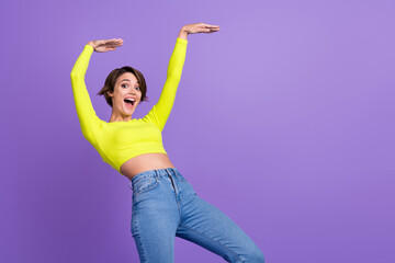 Sticker - Portrait of carefree gorgeous slender person enjoy clubbing dancing empty space ad isolated on purple color background