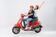© 1112000 - image of asian couple riding scooter on white background
