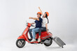 © 1112000 - image of asian couple riding scooter on white background