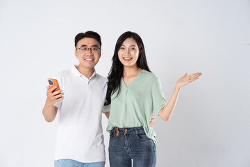 Wall Mural - a couple posing on a white background