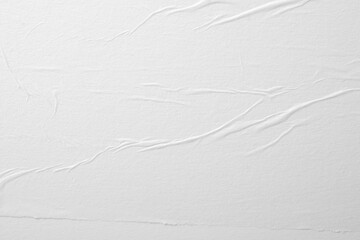 Pronounced creases on white paper. Abstract background.