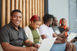 © Katsiaryna - A group of black candidates are waiting for an interview in the office.