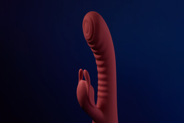 Adult sex toys, dildo on colored background, bunny shaped vibrator.