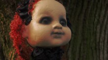 Spooky Porcelain Doll Head Hanging 
