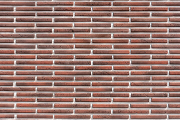 Wall Mural - Tile decorative wall red brick, background pattern.