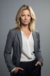 © Adriana - Attractive mature attractive businesswoman  posing looking at the camera