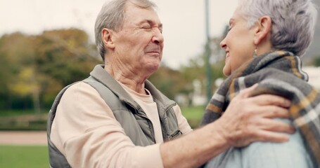 Wall Mural - Kiss, forehead and senior couple in a park with love, happy and conversation with romantic bonding. Kissing, old people and elderly man embrace woman with care, romance or soulmate connection outdoor