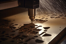 A Close-up Of A CNC Machine's Laser Cutter As It Rapidly And Accurately Slices Through A Large Piece Of Metal