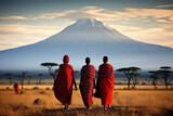Portrait of a Maasai women with traditional jewelry walking towards mount Kilimanjaro 