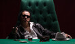 © serikbaib - gambler, poker player, criminal man with a gun