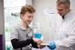 © Tsyb Oleh - A man doctor talks to his boy patient and advises him on medicine