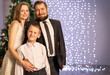 © Evgenia Tiplyashina - christmas family near christmas tree