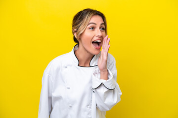 Sticker - Uruguayan chef woman isolated on yellow background shouting with mouth wide open to the lateral