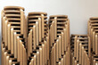 Stacked vintage wooden stools made from bent plywood